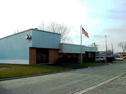 South System building with the American Flag in front